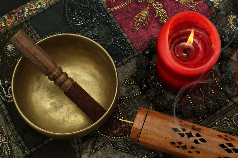 Tibetan singing bowl, incense, candle