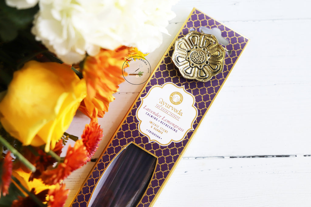 Ayurveda Lavender Lemongrass incense sticks with burner package on white background with yellow, orange, white and green flowers
